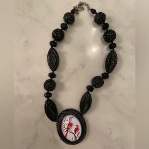 Hotcakes bird necklace.